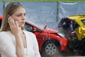 distressed motorist calling for roadside and emergency services